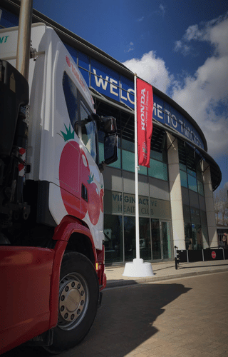 tomato plant specialist haulage and drainage truck at stadium
